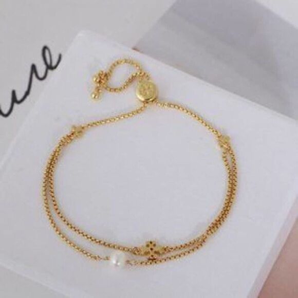 NWOT  Tory Burch Gold Logo & Pearl Adjustable Bracelet - Picture 1 of 10